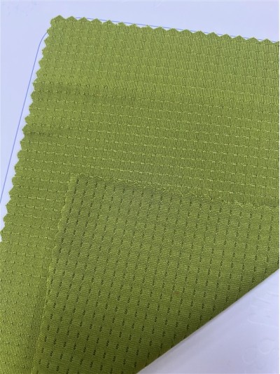 GZ-YXYF 3210# Elastic Shell Net Width: 170CM Weight: 170GSM Composition: 10%spandex 90%polyester Moisture wicking side view